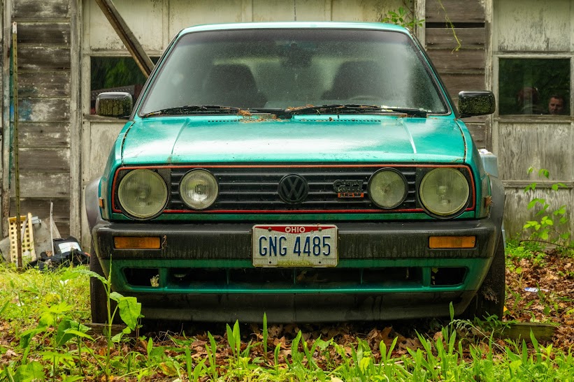 Green 1991 VW GTI before restoration