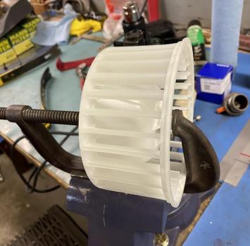 Cracked fan, glued and pressed.