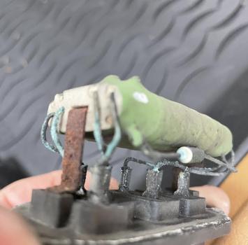 Corroded leads, blown thermal fuse